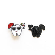 Pin's Dent en vacances