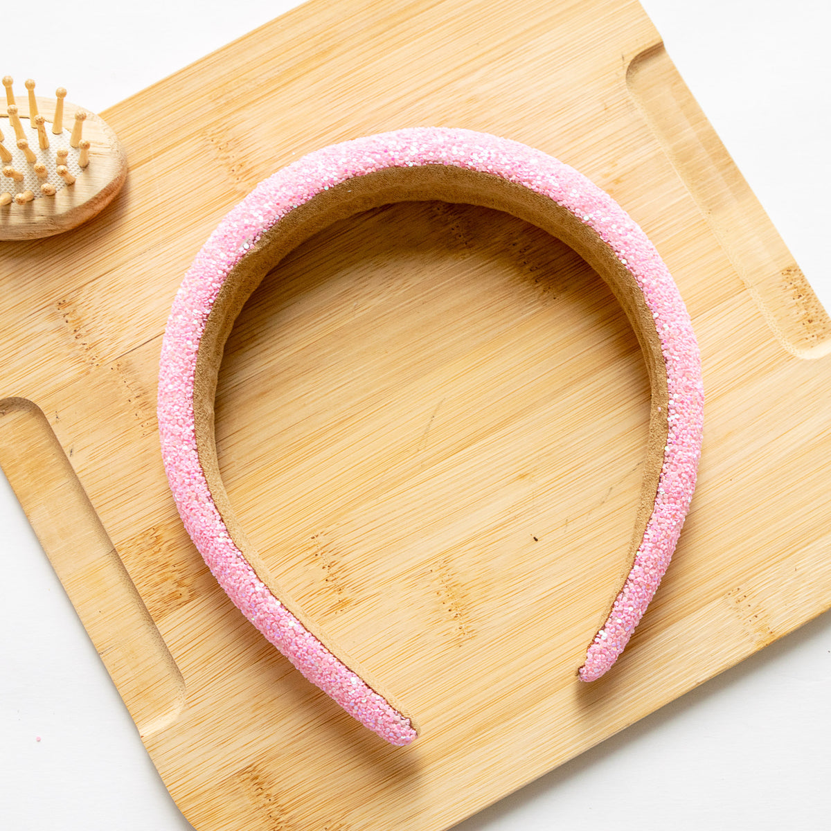 Pinkes glänzendes Stirnband